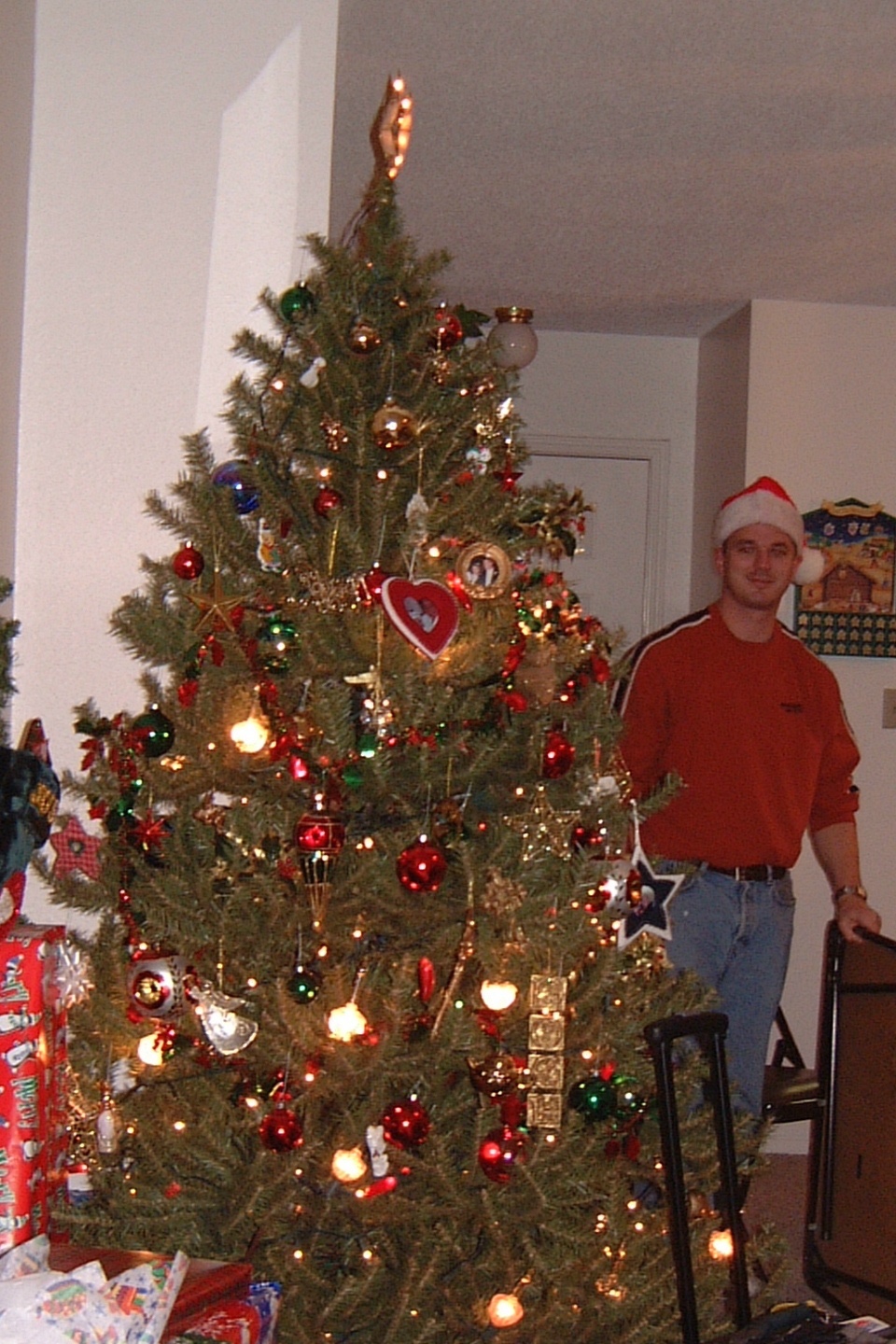 2000-12-21-05 Justin plying Santa.jpg
